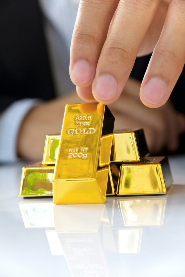 Lingot d'or 100g : un investissement sûr et liquide